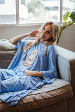 woman in a blue sleep tee shirt
